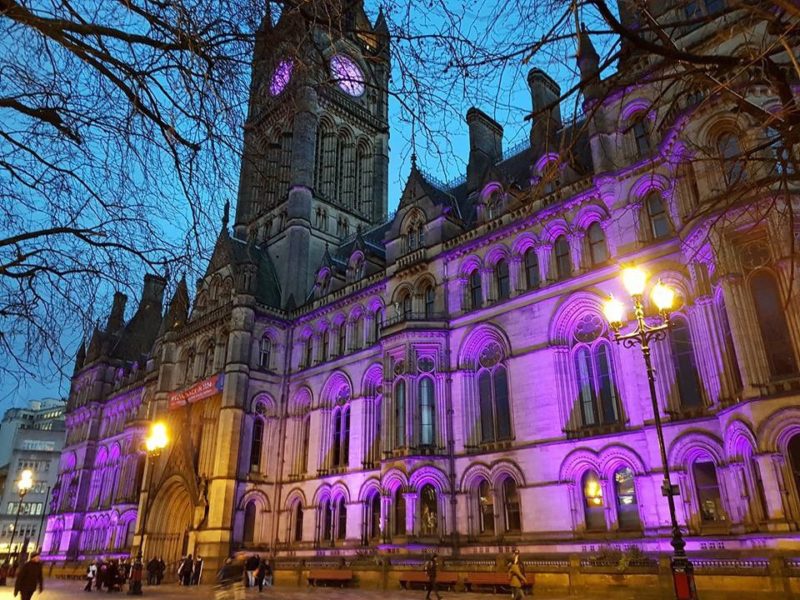 The town hall lit in WASPI colours