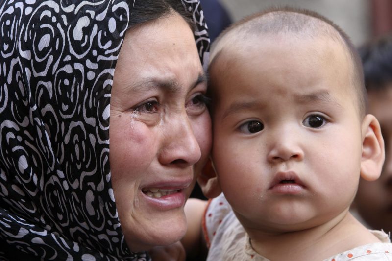 Uyghur woman with child 