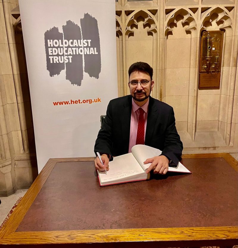 Signing the Holocaust Education Trust Book of Commitment