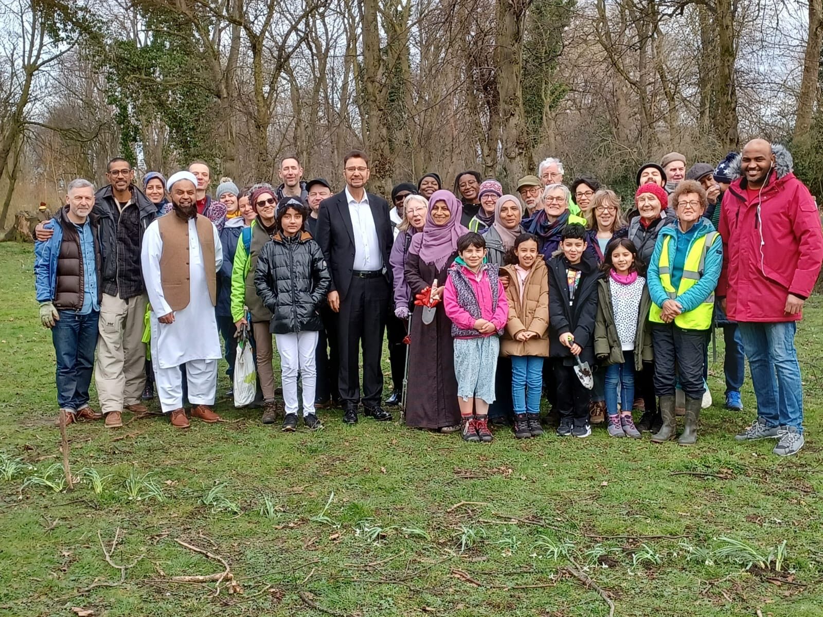 Afzal Khan MP planting snowdrops in Alexandra Park