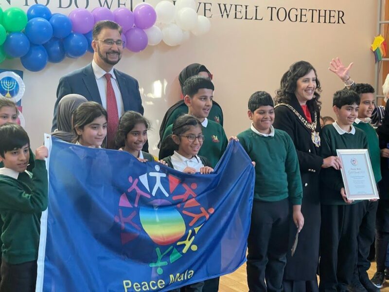 Afzal with children at St Agnes Primary School, Longsight