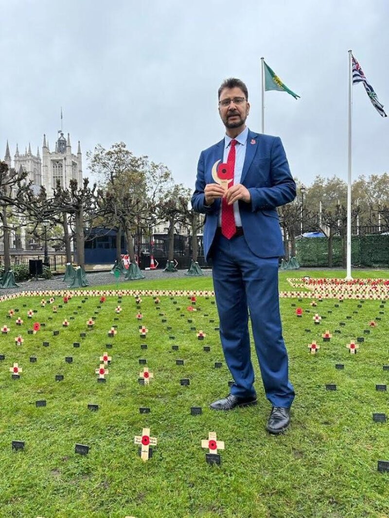 Afzal Khan MP planting a  Remembrance tribute in Parliament
